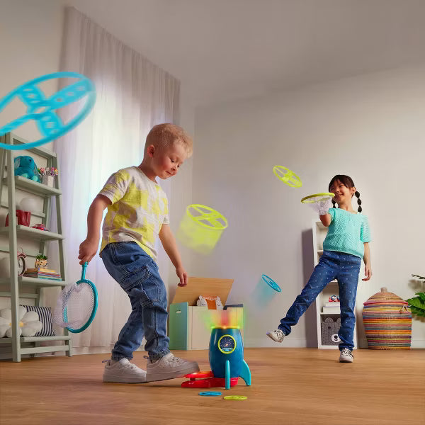 Lanzador de discos voladores con pedal de B. Toys